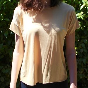 Yellow silky and light t- shirt, never worn